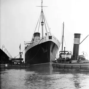 The RMS Mauretania brought up the Thames to King George V Dock at Woolwich The RMS Mauretania brought up the Thames to King George V Dock at Woolwich