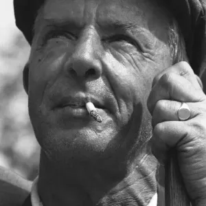 Road Sweeper George Pearce seen here watching the house sparrows that have nested in Road Sweeper George Pearce seen here watching the house sparrows that have nested in