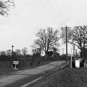 Road works on the approach to Ickenham pond and pump, London. Circa 1930