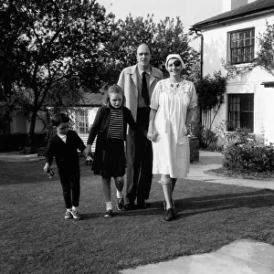 Roald Dahl with his family actress wife Patricia Neal wearing leg iron