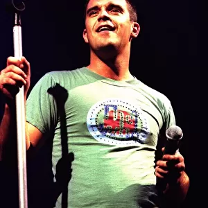 Robbie Williams in concert at Slane Castle, Ireland August 1999 Controversial pop