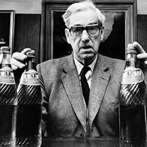 Robert Barr of Barrs Irn Bru with bottles circa 1970