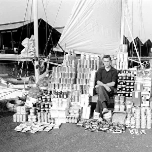 Robin Knox-Johnston with his provisions he will take on his yacht Suhaili