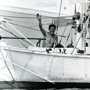 Robin Knox Johnston waves to his parents from his Suhaili boat at Falmouth before his Robin Knox Johnston waves to his parents from his Suhaili boat at Falmouth before his