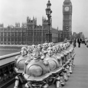 Robots lined up over Westminster Bridge. The robots were supplied by EMI Records who used Robots lined up over Westminster Bridge. The robots were supplied by EMI Records who used