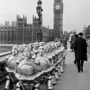 Robots lined up over Westminster Bridge. The robots were supplied by EMI Records who used Robots lined up over Westminster Bridge. The robots were supplied by EMI Records who used