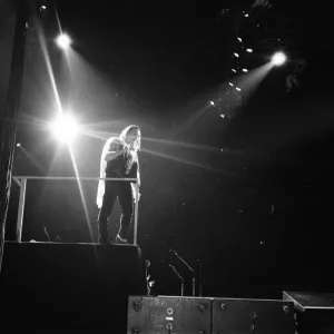 Rock group U2 in concert in USA. Bono on stage. May 1987 Rock group U2 in concert in USA. Bono on stage. May 1987