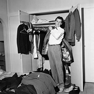 Rock and roll singer Vince Eager shows off his fabulous wardrobe. 5th April 1959