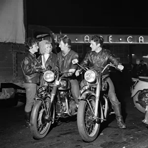 Rocker boys on motorcycles - called "sickles"- talking to girls