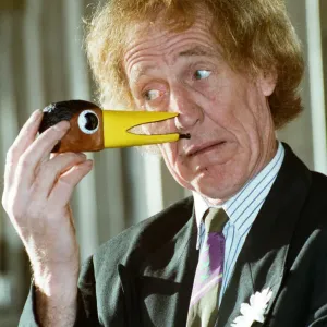 Rod Hull seen here with a miniature head of his feathered partner Emu. 12th January 1993