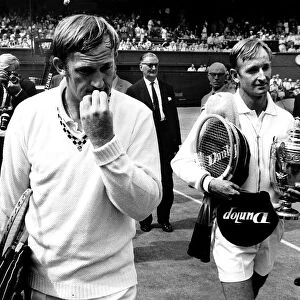 Rod Laver wins Wimbledon mens singles final 1968 leavesd the court with his opponent Tony