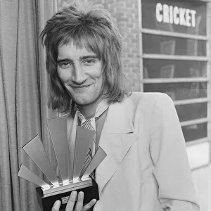 Rod Stewart holding his Best Singer Award at The Oval Pop Festival, Oval Cricket Ground