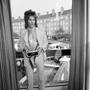 Rod Stewart holding his Best Singer Award at The Oval Pop Festival Rod Stewart holding his Best Singer Award at The Oval Pop Festival