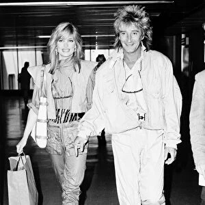 Rod Stewart Rock Singer Songwriter at Heathrow with his girlfriend Kelly Emberg
