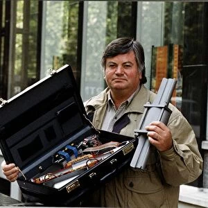 Roger Cook TV Presenter with a bomb device built in a suitcase which he took to Moscow