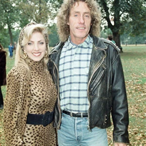 Roger Daltrey, singer of British rock group The Who, pictured with actress Lynsey de Paul