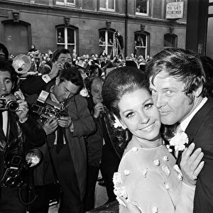 Roger Moore Actor and third wife Luisa Mattiolli Actress at Caxton Hall after wedding