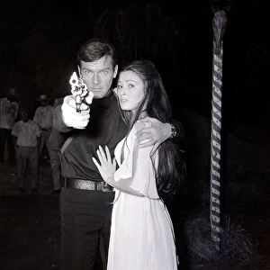 Roger Moore and Jane Seymour on the set of Live and let Die at Pinewood film studios 1973