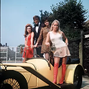 Roger Moore with (L-R) Claudie Lange, Gabrielle Drake and Veronica Carlson
