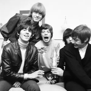 Rolling Stones celebrate in their Manchester hotel after hearing news that their latest