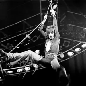 Rolling Stones Concert, Stones singer Mick Jagger swings high in the air during a concert Rolling Stones Concert, Stones singer Mick Jagger swings high in the air during a concert