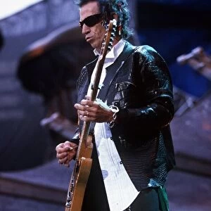 Rolling stones in concert at Wembley Stadium 12th June 1999 Keith Richards playing