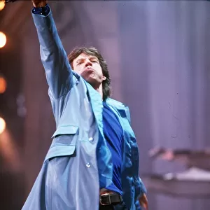 Rolling Stones in concert at Wembley Stadium 12th June 1999 Mick Jagger arm raised