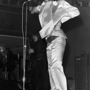 Rolling Stones lead singer Mick Jagger performing on stage in Manchester during their