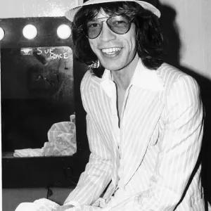 Rolling Stones: Mick Jagger relaxing in his dressing room before a concert May 1976 Rolling Stones: Mick Jagger relaxing in his dressing room before a concert May 1976