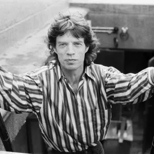 Rolling Stones singer Mick Jagger posing on top of the Daily Mirror Newspaper building Rolling Stones singer Mick Jagger posing on top of the Daily Mirror Newspaper building