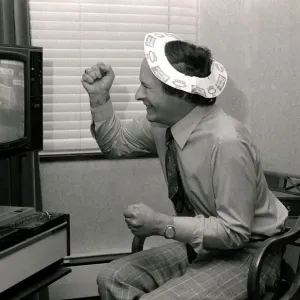 Romark - Hypnotist / Magician Print watching a football match on television