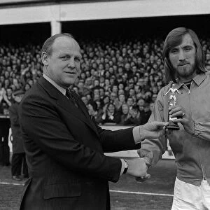 Ron Greenwood presents Billy Bonds with his player award before the West Ham v Chelsea
