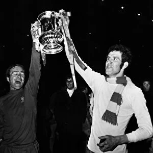 Ron Harris & Peter Osgood of Chelsea holding the FA cup as they celebrate victory against