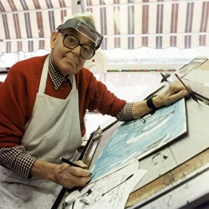 Ronald Carl Giles - Daily Express cartoonist at his drawing board in his studio