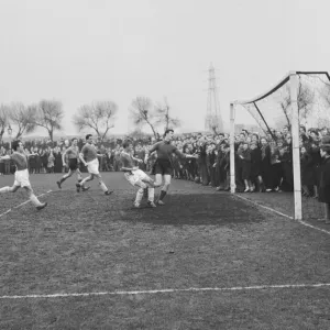 Ronnie Corbett far left assists Tommy Steele to score a goal in theTV All Stars XI vs