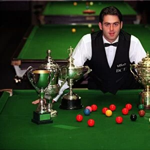 Ronnie O Sullivan with trophies on table September 1997