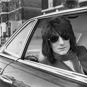 Ronnie Wood Guitar player with the Rolling Stones drives away from his Richmond home