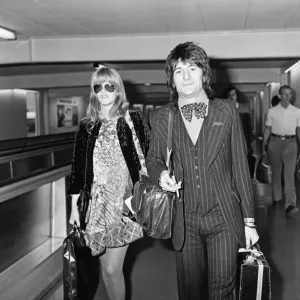 Ronnie Wood and his wife Krissy at Heathrow Airport for a holiday in Nassau