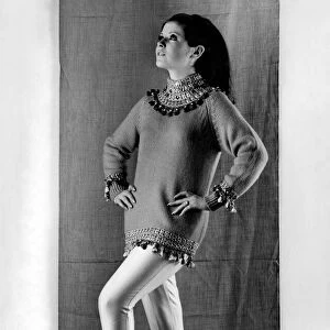 Rosemary Bell modelling mini dress worn over slacks September 1965 P009447