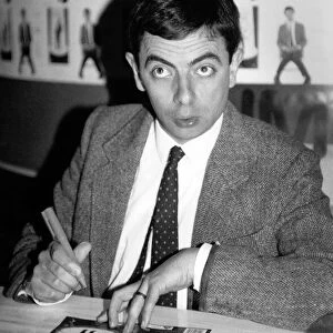 Rowan Atkinson sign copies of a Mr Bean video at HMV music store in Oxford Street