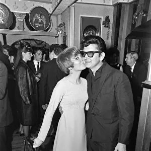 Roy Orbison birthday party. Singer Lulu kisses Roy on the cheek at a party held at Dolce
