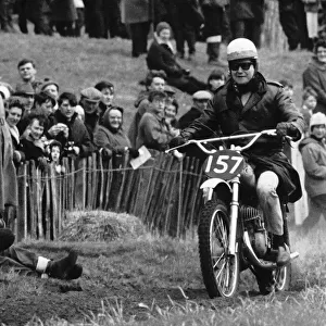 Roy Orbison Singer riding a trials motorbike at a meeting before crashing