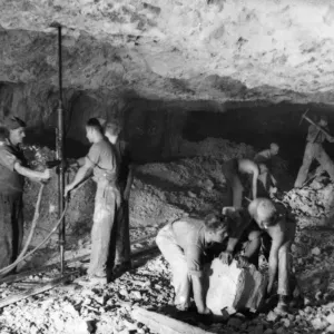 Royal Engineer tunnellers using a water pressure drill to clear solid rock while creating Royal Engineer tunnellers using a water pressure drill to clear solid rock while creating
