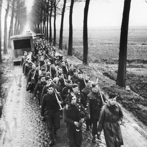 Royal Irish Fusiliers are piped back to their camp after a days work in France Royal Irish Fusiliers are piped back to their camp after a days work in France