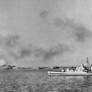 Royal Navy cruiser bombarding enemy positions at Anzio. 3rd February 1944 Royal Navy cruiser bombarding enemy positions at Anzio. 3rd February 1944