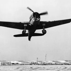 A Royal Navy Grumman Hellcat springs into the air at Roosevelt Field, Long Island A Royal Navy Grumman Hellcat springs into the air at Roosevelt Field, Long Island