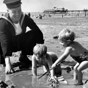 Royal Navy sailor A Ryder enjoys his time on leave as he spends the day with his two sons Royal Navy sailor A Ryder enjoys his time on leave as he spends the day with his two sons