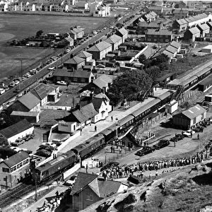 The Royal train pulls into Harlech station. Picture taken from The Ramparts of