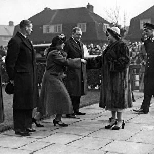 Royal visitors at Mitchell Gardens, Wythenshawe. Princess Elizabeth shaking hands with