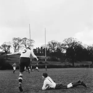 A rugby team of the Auxiliary Fire Service seen here playing against Beaumont College